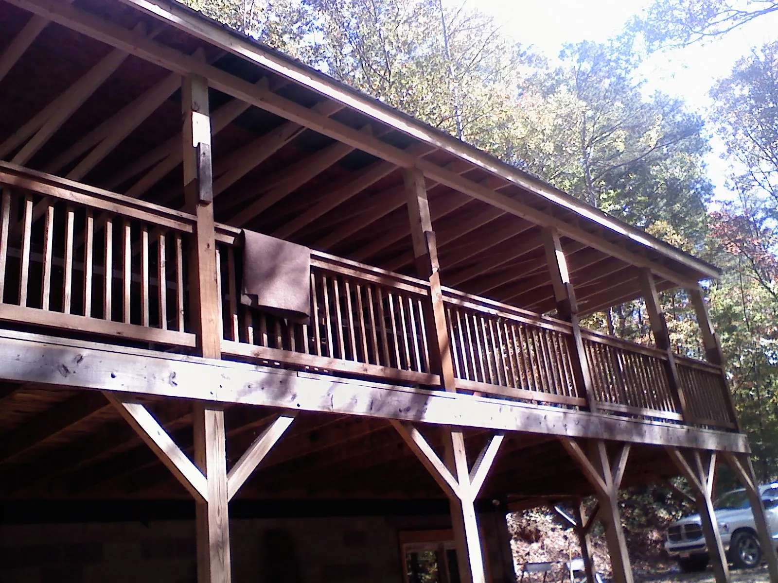 Timber framing under a new elevated porch and deck — Roof Leak Repair in Fort Pierce by Roofing Brothers